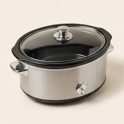 A steel slow cooker with a glass lid
