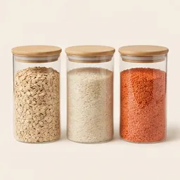 Glass storage jars of oats, rice and lentils