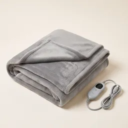 A grey heated throw with its controller