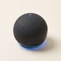 A small round smart speaker